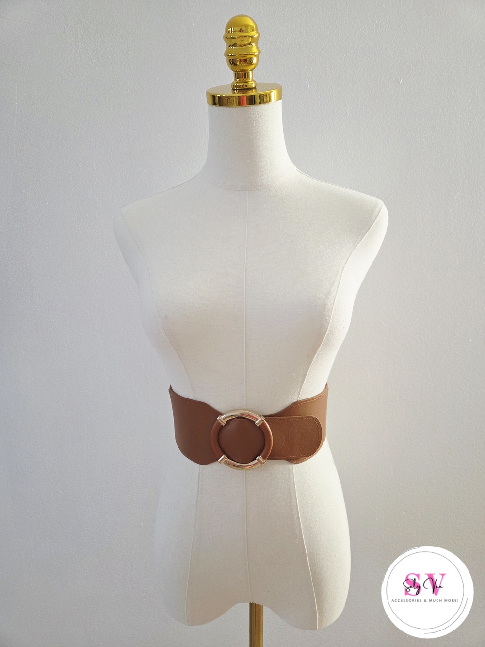 Stretchy brown waist belt with gold buckle